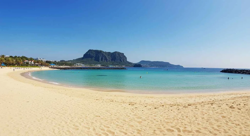 Sunny beaches and vibrant summer activities on Jeju Island, showcasing its stunning natural landscapes and coastal beauty