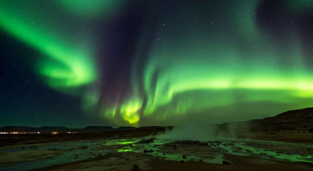 The Northern Lights over the rugged landscape of Iceland, one of Europe’s most unique natural wonders.